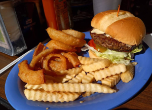 burger, fries, and onion rings from Gina's Place