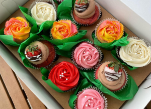 variety of cupcakes in box