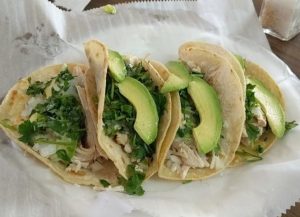 chicken street tacos with avocado slices