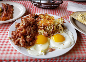 hashbrowns, eggs from Eggsellent Cafe